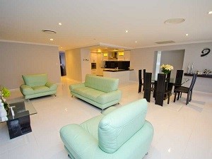 Bundaberg builders CRJ Designer Homes showing house plan layout of an open space lounge room