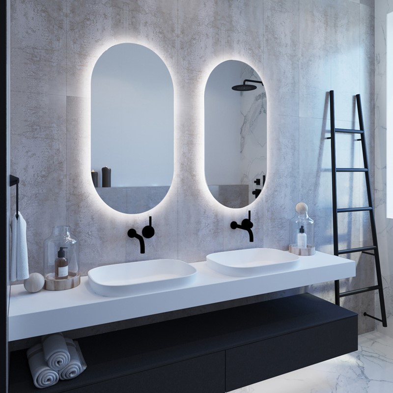Free-standing framed mirror with light glowing around it