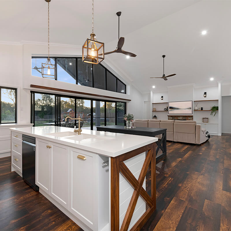 Dark timber flooring with white interior in stunning home build