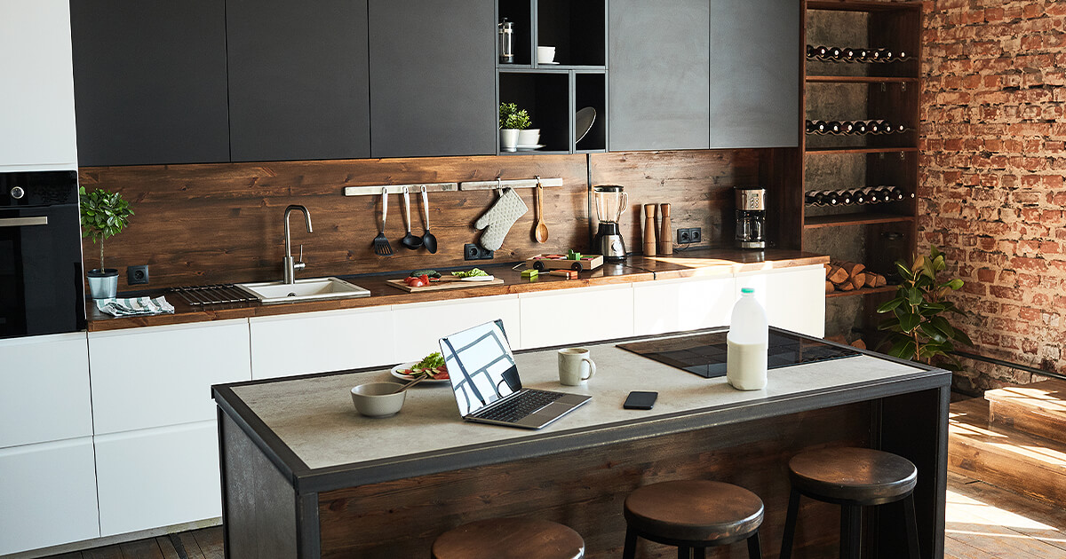 White and black kitchen with industrial and dark timber and reclaimed brick look