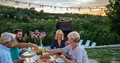 Outdoor entertaining with a family at sunset