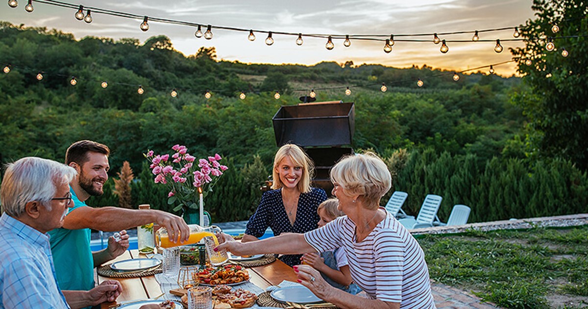 Outdoor entertaining with a family at sunset