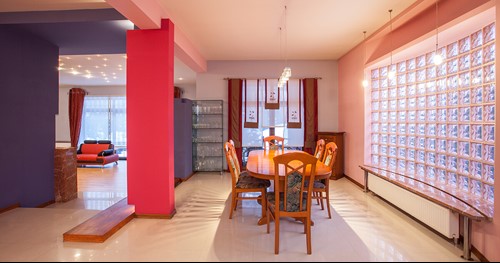 A dining room with 80s inspired interior design