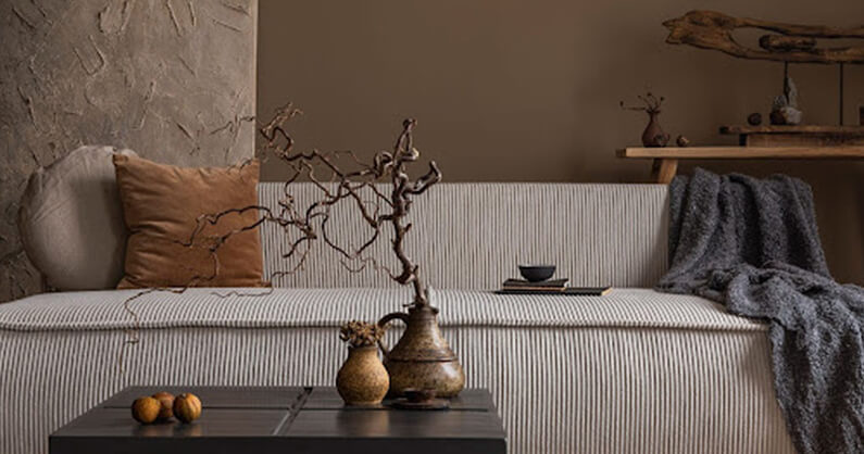 wabi-sabi style couch and decor