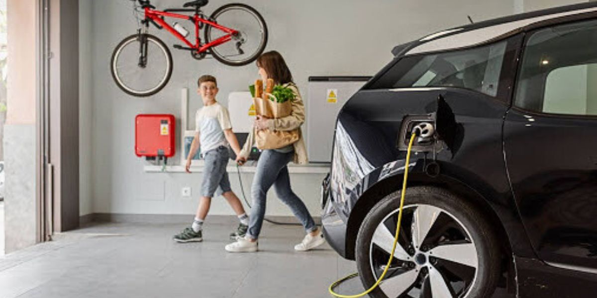 Family in garage with car